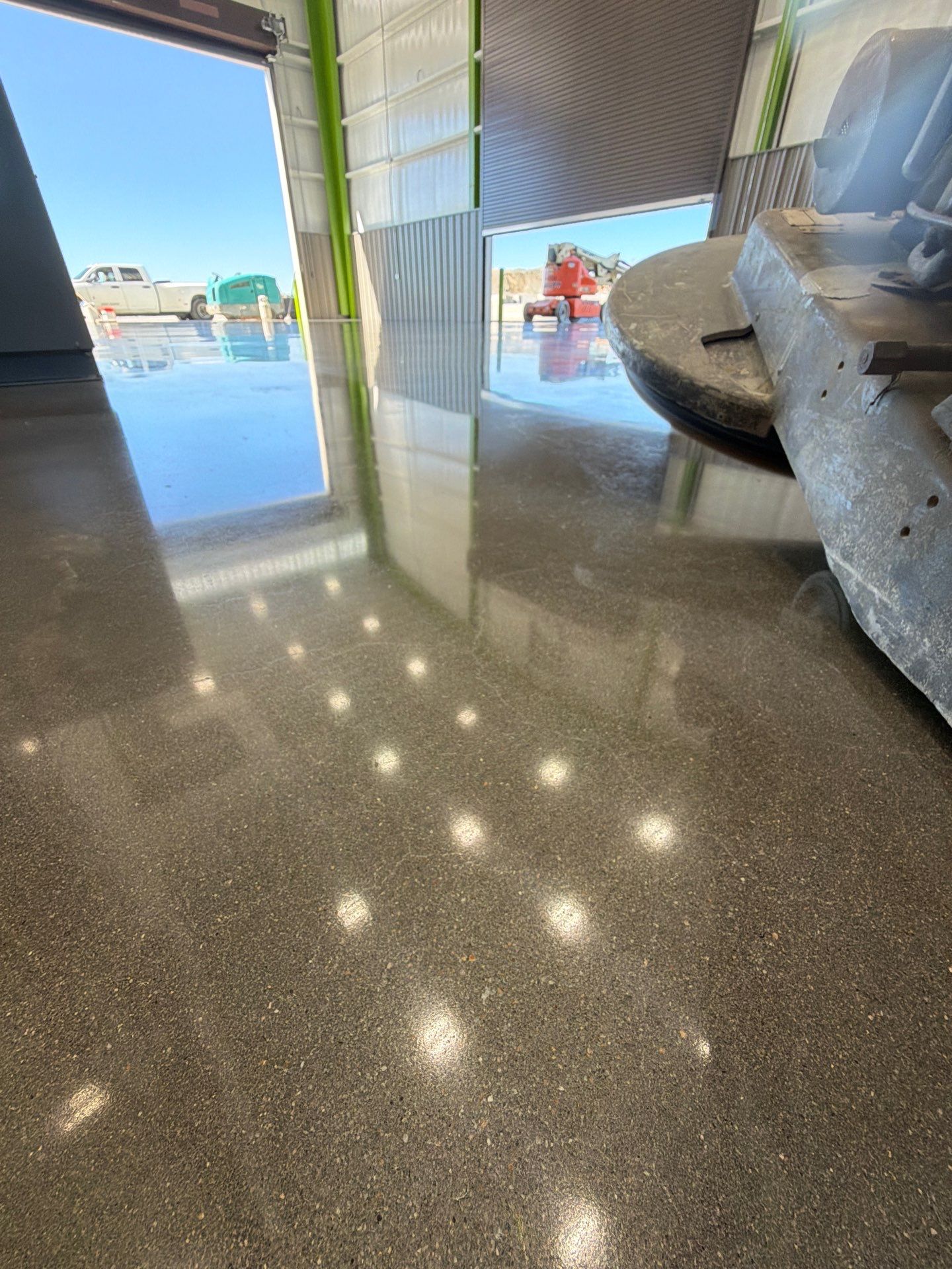 High-gloss polished concrete floor in an industrial maintenance facility in Greenville, SC